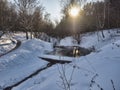 Pond and track in winter park