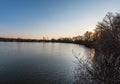 Pond with trees around in CHKO Poodri in Czech republic during springtime evening