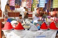 PONDA, GOA, INDIA, January 2005, Sellers sell Kumkum or colored powder at Mangueshi temple. Royalty Free Stock Photo