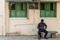 Man sitting on a bench in Pondicherry