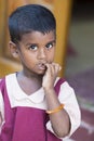 Poverty, portrait of a poor little Indian child girl lost in deep thoughts Royalty Free Stock Photo