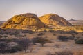 The Pondoks near the Spitzkoppe mountain at sunset in Namibia. Royalty Free Stock Photo