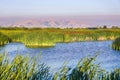 Ponds at sunset in Coyote Hills Regional Park; on the background smoke from Soberanes fire is visible, Fremont, San Francisco bay Royalty Free Stock Photo