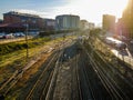 Train entering the Ponferrada station at dawn with the rest of the roads cleared and with construction materials Royalty Free Stock Photo