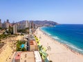 Poniente beach of Benidorm in summer seen from the heights of a skyscraper with the beach, the sea and other buildings of hotels Royalty Free Stock Photo