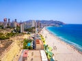 Poniente beach of Benidorm in summer seen from the heights of a skyscraper with the beach, the sea and other buildings of hotels Royalty Free Stock Photo