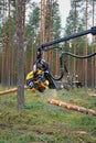 Ponsse Harvester Head Cutting Wood