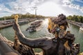 The Pont Alexandre III (bridge) with sculptures against tourist boat on Seine and Eiffel Tower in Paris, France Royalty Free Stock Photo