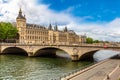 Pont au Change bridge over Seine river and Conciergerie palace and prison in Paris, France Royalty Free Stock Photo