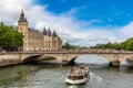 Pont au Change bridge over Seine river and Conciergerie palace and prison in Paris, France Royalty Free Stock Photo