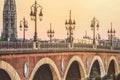 Pont de Pierre bridge in Bordeaux at sunset Royalty Free Stock Photo