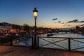 Pont des arts street lamp at night. Paris seine bridge with lantern. Morning river view Royalty Free Stock Photo