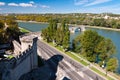 Pont du Avignon and city walls tower beside street and Rhone riv