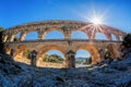 Pont du Gard against sunset is an old Roman aqueduct in Provence, France Royalty Free Stock Photo