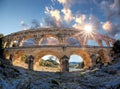 Pont du Gard against sunset is an old Roman aqueduct in Provence, France Royalty Free Stock Photo