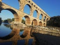 Pont du Gard - reflection it the river
