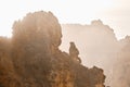 Ponta da Piedade headland with group of rock formations textures background yellow-golden cliffs along limestone coastline, Lagos