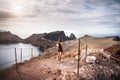 Ponta De Sao Lourenco at Madeira Islands - Portugal, Beautiful woman standing against view. View of rocks, beach, cliffs and mount