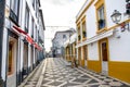 Ponta Delgada, Azores, Portugal - Jan 12, 2020: Empty street with bars and restaurants in the historical center of the Portuguese Royalty Free Stock Photo