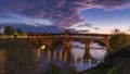 Ponte Coperto (covered bridge) over Ticino river in Pavia at blue hour Royalty Free Stock Photo