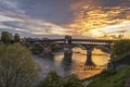 Ponte Coperto (covered bridge) over Ticino river in Pavia at sunset Royalty Free Stock Photo