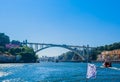 View of Ponte da Arrabida, last bridge over Douro River towards Atlantic Ocean, Porto, Portugal Royalty Free Stock Photo