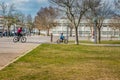 Ponte de Sor PORTUGAL - March 19, 2022 - Family of father and son riding a bike in Campo da RestauraÃÂ§ÃÂ£o park