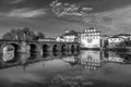 Ponte de Trajano reflected on Tamega river in Chaves, Portugal Royalty Free Stock Photo