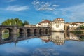 Ponte de Trajano reflected on Tamega river in Chaves Royalty Free Stock Photo