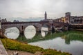 Ponte Pietra inVerona city : Picturesque Roman arch bridge, built in 100 BC. NS. and rebuilt after World War II