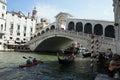 Ponte Rialto with boats in summer