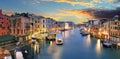 Ponte Rialto and gondola at sunset in Venice, Italy Royalty Free Stock Photo
