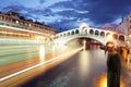 Ponte Rialto and gondola at sunset in Venice, Italy Royalty Free Stock Photo