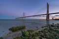 Ponte Vasco da Gama Bridge view near the Rio Tejo river after sunset, Portugal Royalty Free Stock Photo