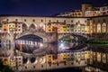 Ponte Vecchio in Florence by Arno river at night, Florence, Firenze, Italy Royalty Free Stock Photo