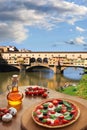 Ponte Vecchio in Florence with pizza Royalty Free Stock Photo