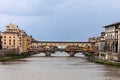 Ponte Vecchio, the historic old bridge over Arno river in Florence, Tuscany, Italy om an overcast day. Royalty Free Stock Photo
