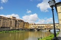 Ponte Vecchio over Arno River, Florence, Italy, Europe. Old bridge with gift shops and houses is famous landmark of Florence. Royalty Free Stock Photo