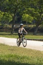 young practice cycling in a park