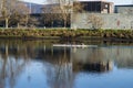 A group of kayak paddlers practice on a River