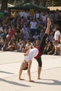 A group of teenagers doing a gymnastic display