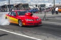 Pontiac drag car making a smoke show Royalty Free Stock Photo