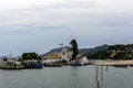 Pontikonisi area at Corfu island with flying airplane, Greece Royalty Free Stock Photo