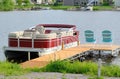 Pontoon Boat Tied to a Dock Royalty Free Stock Photo