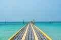 Pontoon walkway floating with pillar on tropical sea Royalty Free Stock Photo