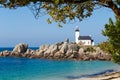 Pontusval Lighthouse on rocky shore Royalty Free Stock Photo