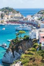 The port of the Ponza island in summer, Italy. Coloured houses, boats, ferry in the harbour of island of Ponza.