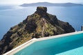 Pool with an amazing view over Skaros rock, Imerovigli in Santorini, Greece