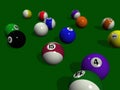 Pool balls on a green billiard table Royalty Free Stock Photo