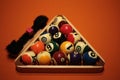 Pool balls pyramid on orange cloth for eightball game